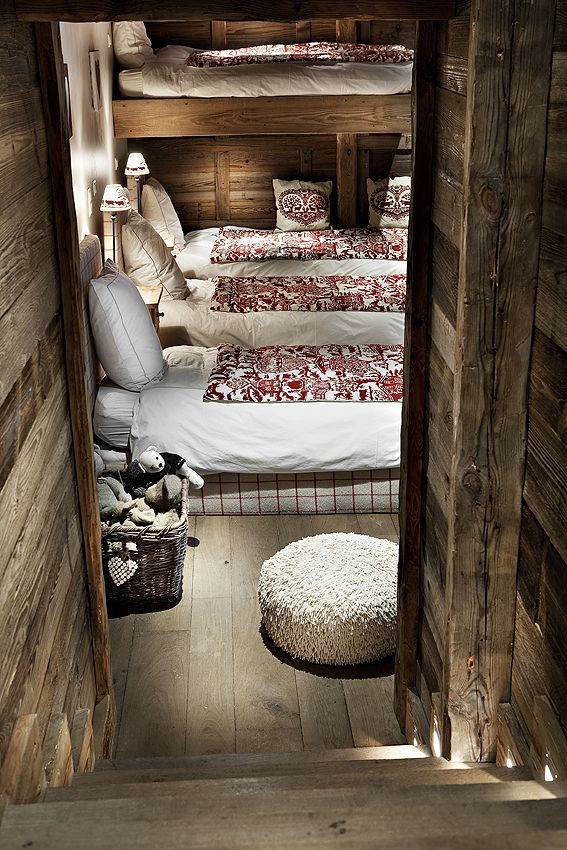beds for children in a wooden house