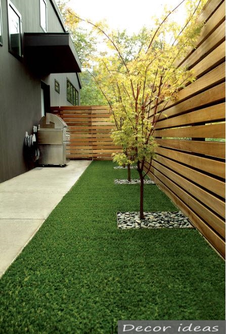 The trees in the backyard can be decorated with stones