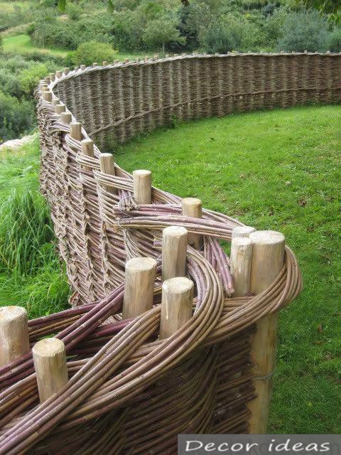 interconnected vine for an even fence, mounted between rough wooden rods