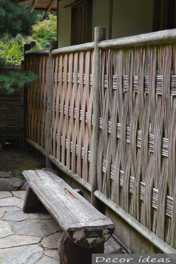 element fence from thin wooden rods